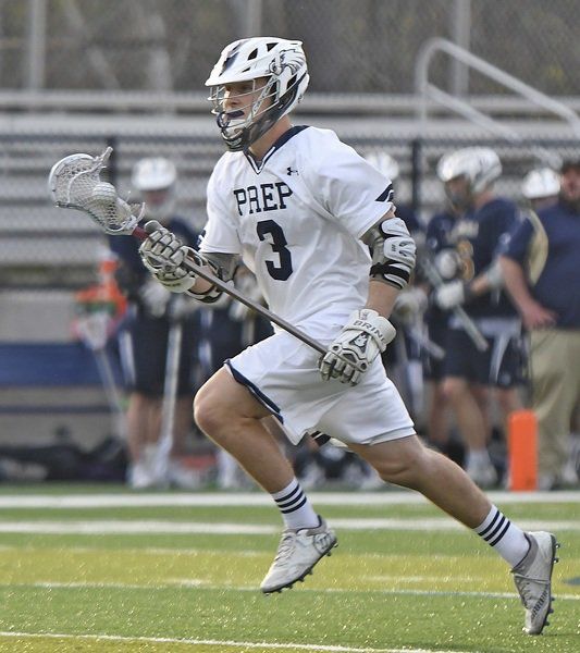 Prep lax squad handles MC, climbs over .500